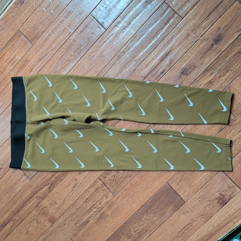 Nike Leg-A-See Allover Olive Green Leggings with White Swoosh Print - Picture 4 of 8
